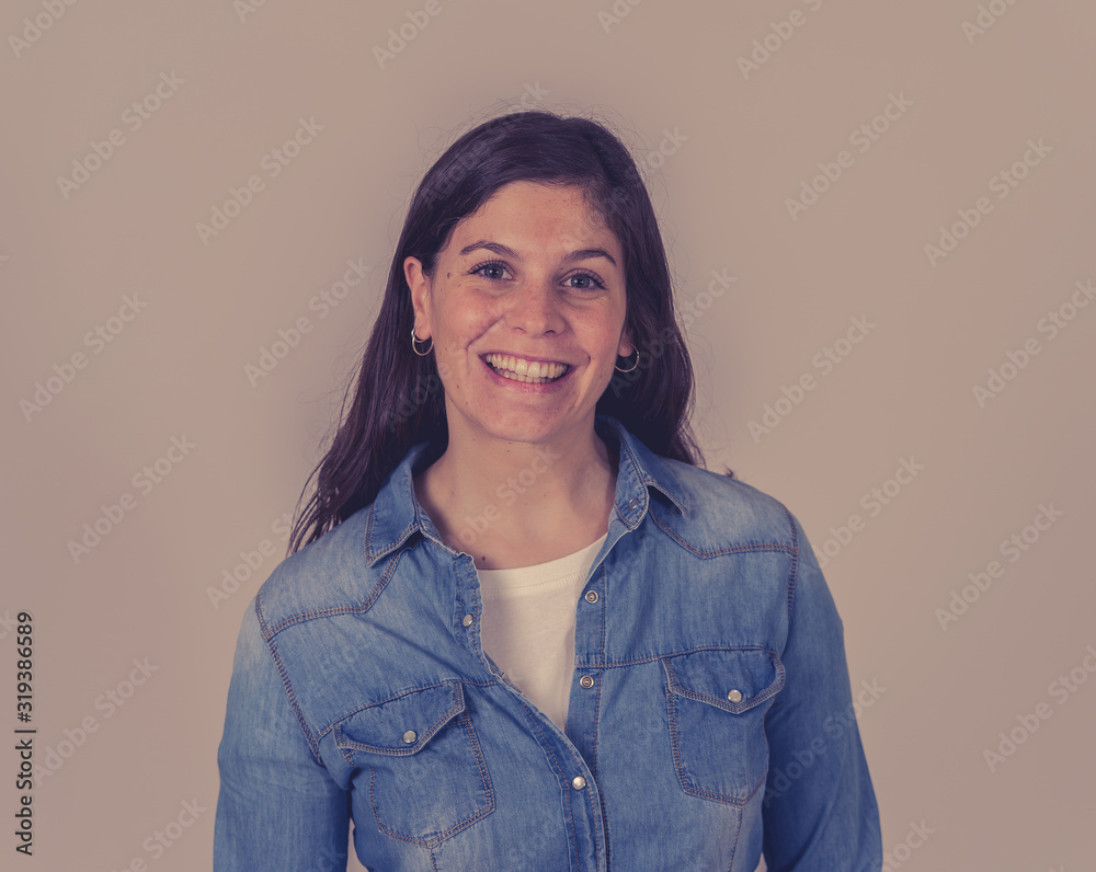 Portrait of young attractive cheerful woman with smiling happy face. Human expressions and emotions Portrait of young attractive cheerful woman with smiling happy face. Human expressions and emotions