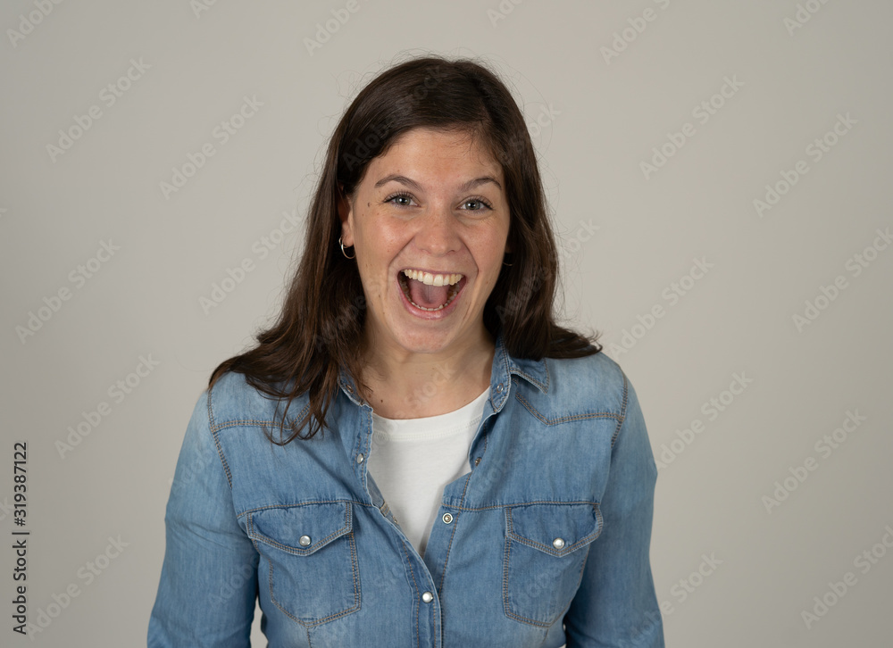 Portrait of young attractive cheerful woman with smiling happy face. Human expressions and emotions Portrait of young attractive cheerful woman with smiling happy face. Human expressions and emotions