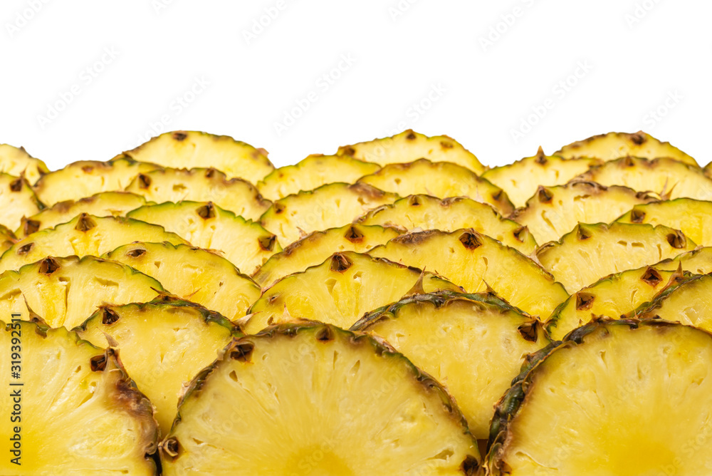 Pineapple juicy yellow slices background. Top view. Pineapple juicy yellow slices background. Top view.