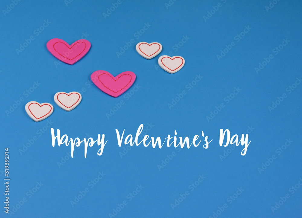 Happy Valentine's Day greeting card. Pink hearts on a blue background stock images. Valentines Day romantic background. Valentine's Day concept. White and pink hearts shape