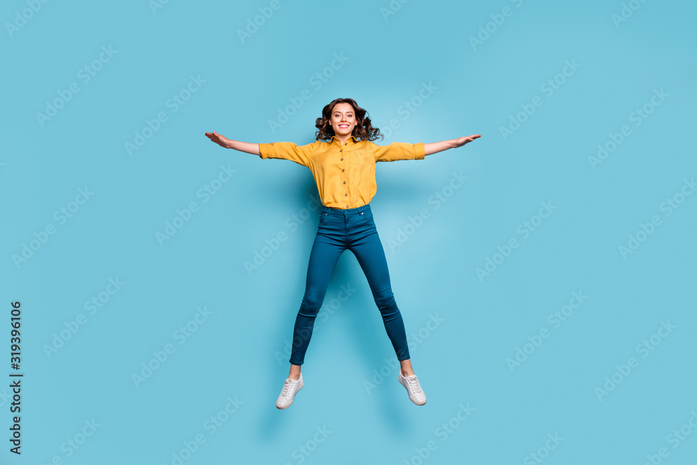 Full length body size view of her she nice attractive lovely cheerful cheery wavy-haired girl jumping having fun free spare time isolated on bright vivid shine vibrant green blue turquoise color