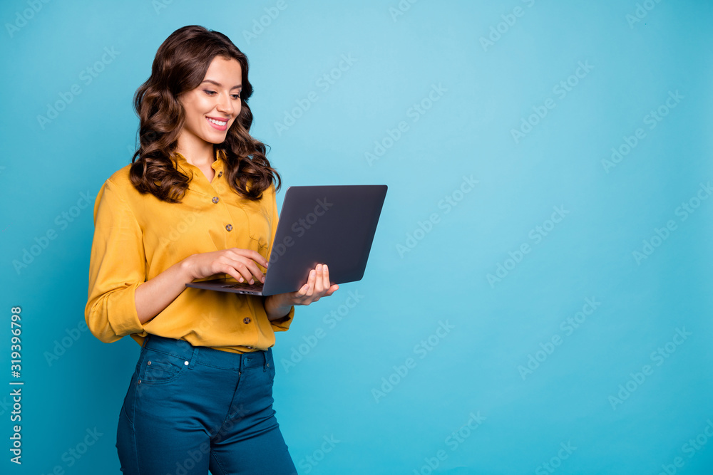 Portrait of her she nice attractive lovely cheerful cheery wavy-haired girl holding in hands laptop creating presentation isolated over bright vivid shine vibrant green blue turquoise color background Portrait of her she nice attractive lovely cheerful cheery wavy-haired girl holding in hands laptop creating presentation isolated over bright vivid shine vibrant green blue turquoise color background