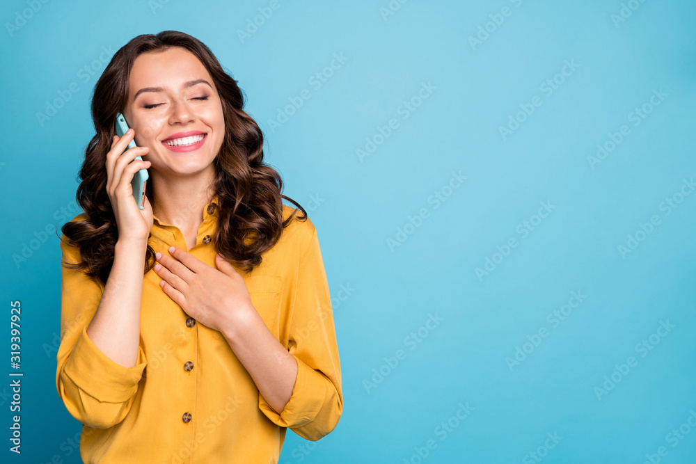 Fototapeta premium Close-up portrait of her she nice attractive lovely cheerful cheery wavy-haired lady talking on phone calling home isolated over bight vivid shine vibrant green blue turquoise color background