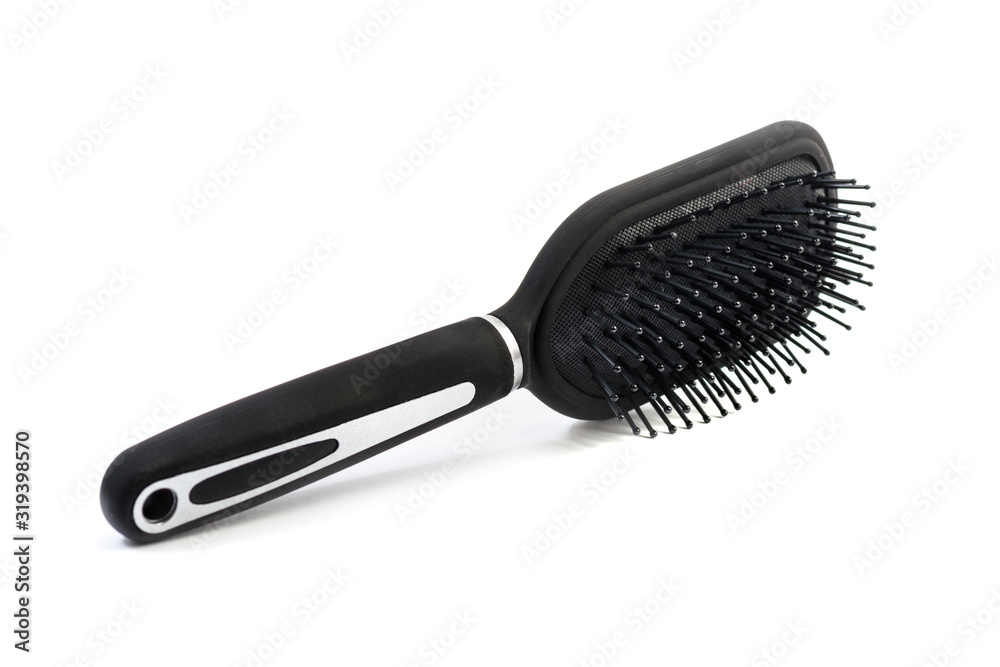 Black and silver hairbrush isolated o Black and silver hairbrush isolated o