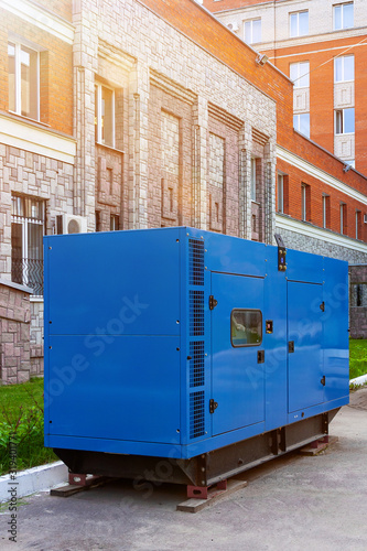 Diesel generator for emergency power supply at the wall of the medical center on a nice Sunny day. Close-up