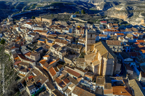 Aerial panoramic view of Jorquera town and castle above the Jucar river bend in Albacete province Spain