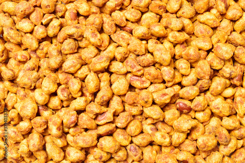 crispy coated masala peanut texture background, top view