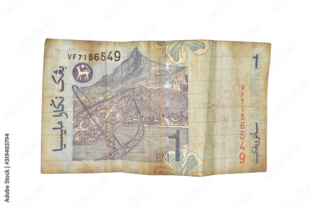 old and crumbled Malaysia currency isolated on white background