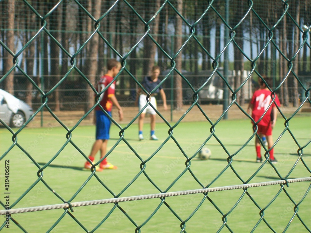 Obraz premium kids playing soccer