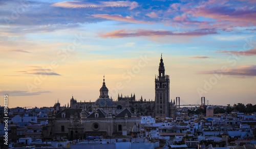 Beautiful of twilight and dusk sky mood at Seville, Spain city and Old Quarter skyline in a sunset sky scene © SASITHORN
