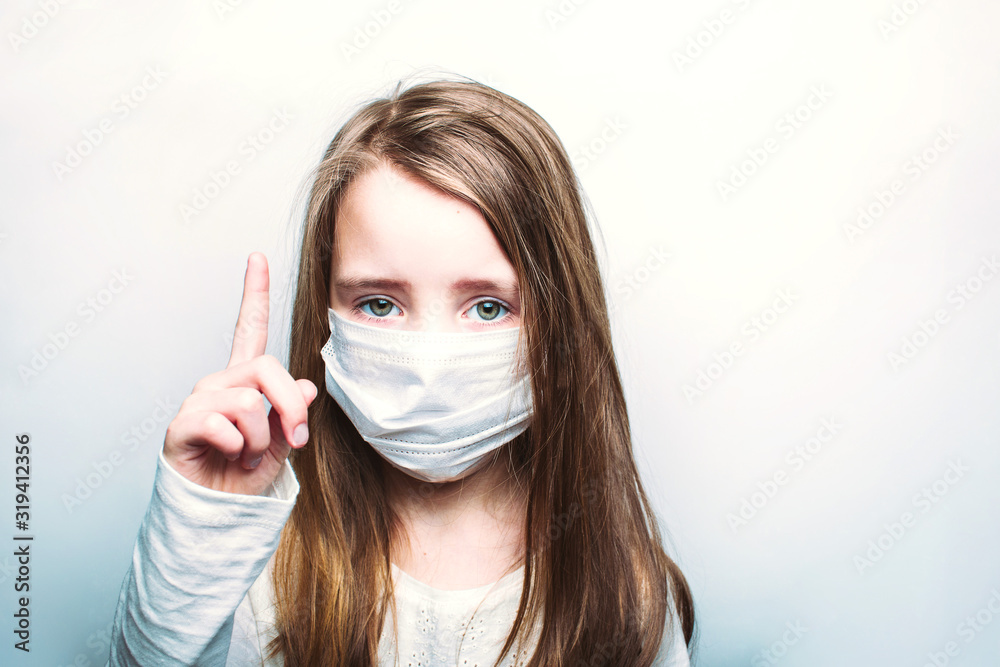 Child in a medical mask, protection against flu and colds Child in a medical mask, protection against flu and colds