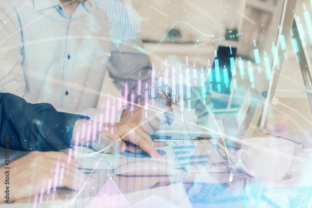 Multi exposure of chart with man typing on computer in office on background. Concept of hard work. Multi exposure of chart with man typing on computer in office on background. Concept of hard work.
