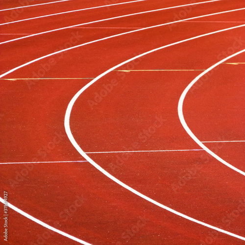 Abstract closeup view of a red running track © Creatus