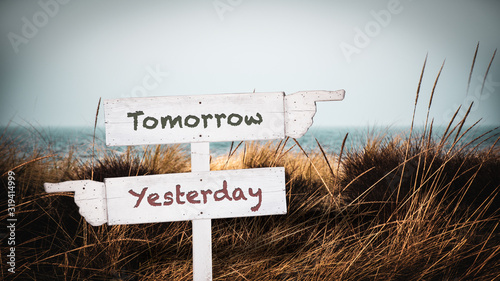 Street Sign to Tomorrow versus Yesterday
