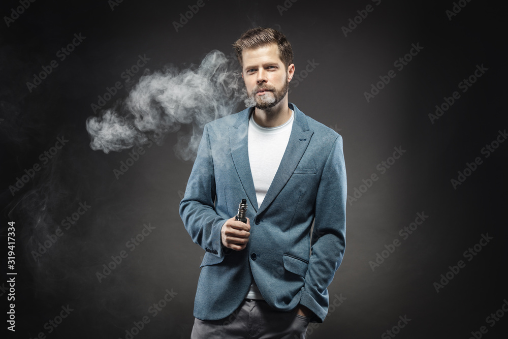 Vaping e-liquid from an electronic cigarette Vaping e-liquid from an electronic cigarette