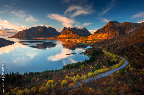 Autumn in Senja Island in Norway with beautiful light and colors. photo