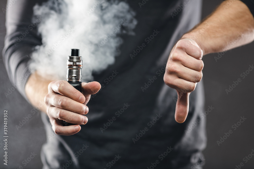 Fototapeta premium Vaping e-liquid from an electronic cigarette