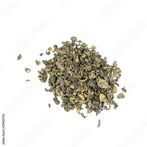 pile of natural ceylon whole leaf Dimbula green tea isolated on white background