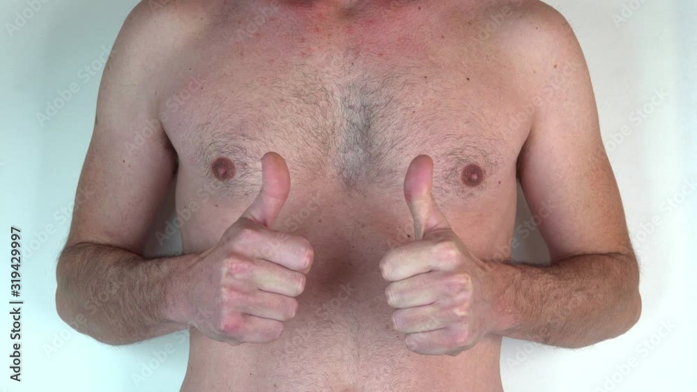 Caucasian shirtless man with thumbs up Caucasian shirtless man with thumbs up