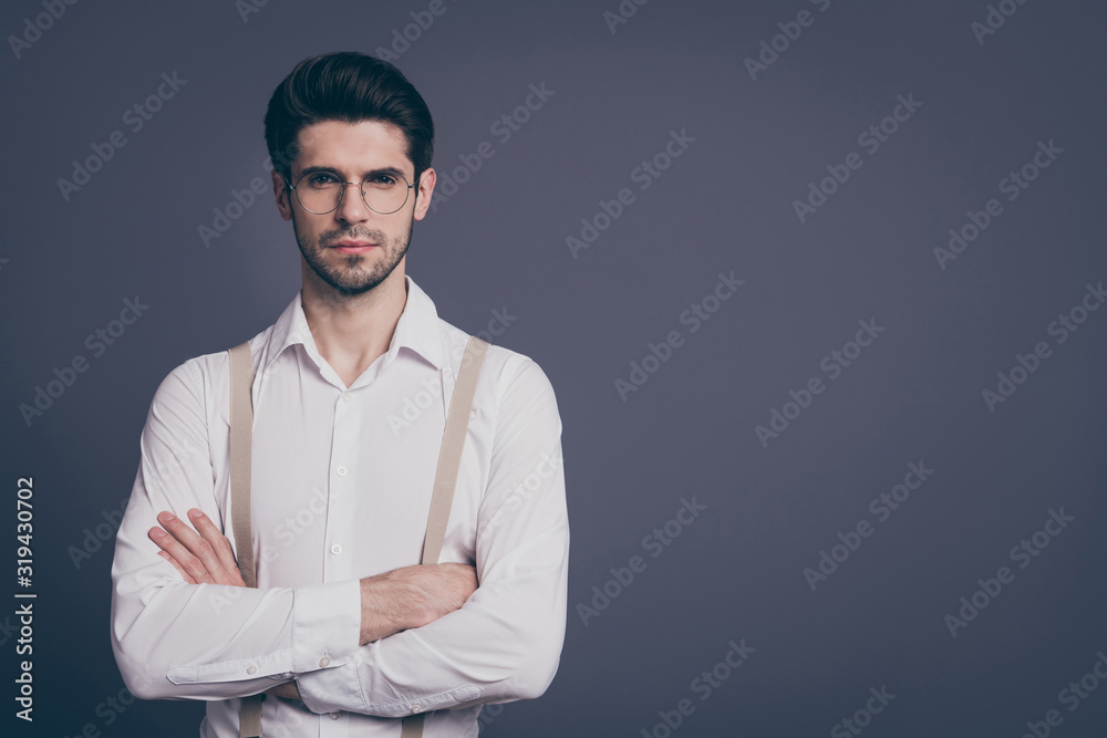 Photo of handsome business man hands crossed strict boss dressed formalwear white shirt beige suspenders specs isolated grey color background