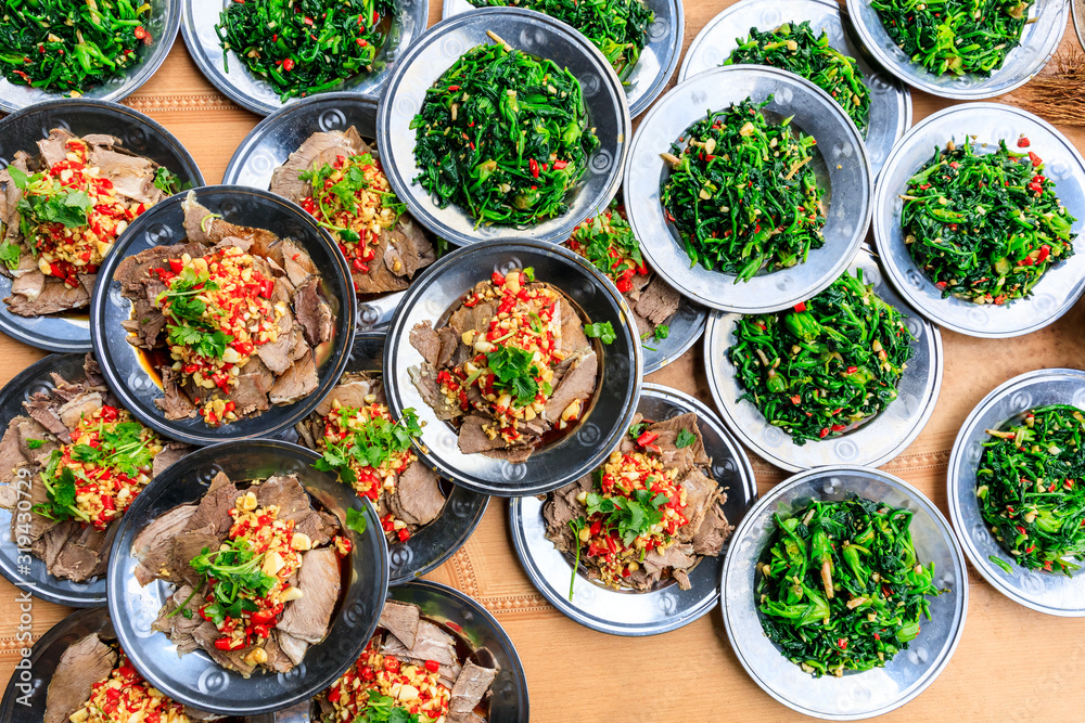 Delicious dried beef slices and spinach cold dish.Chinese food.top view. Delicious dried beef slices and spinach cold dish.Chinese food.top view.