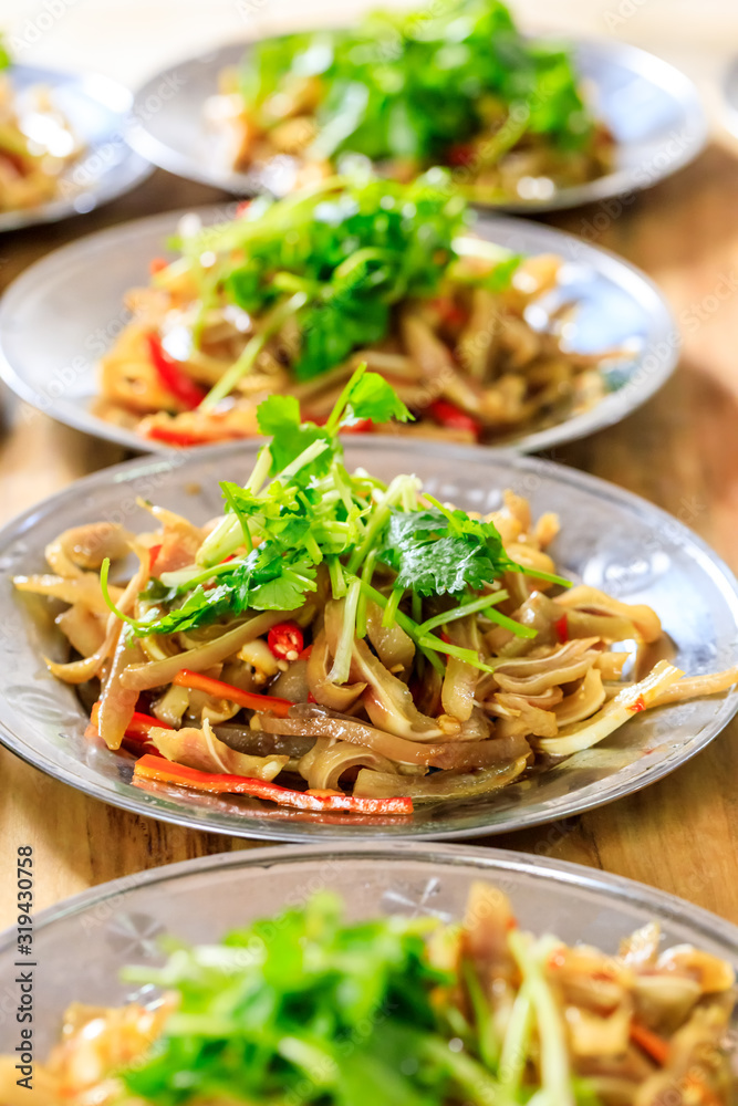 Delicious pork ears snack cold dish,the ingredients are chili and garlic with coriander.Chinese food.