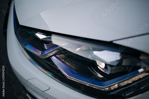 Modern car led headlight with reflection