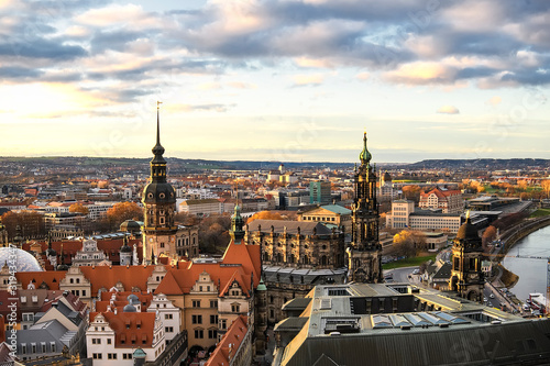 Panorama of Dresden city with bridges over Elbe river at sunset from lutheran church of Our Lady Frauenkirche, Germany.