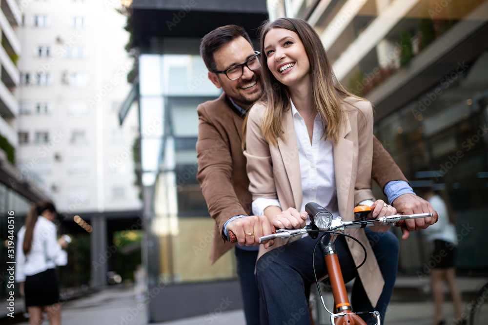 Fototapeta premium Happy smiling young couple having fun in the city