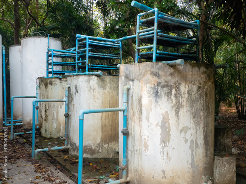 The water supply plant is installed and produced the clean water in rural area.The clear water on top will pass through filters of differ compositions ;sand, charcoal to remove dissovled particles.    photo