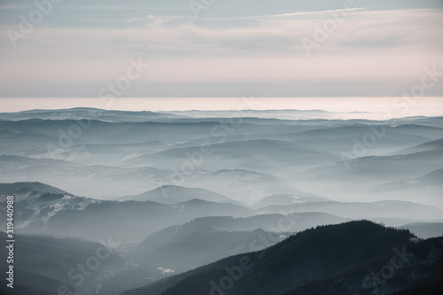 Hills and valleys covered by clouds and mist during inversion weather  Slovakia