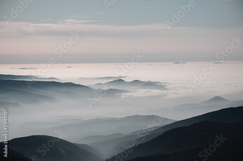 Hills covered by clouds during inversion weather, Slovakia © Lukas