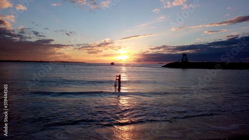 Net fishing sunset on sea  photo