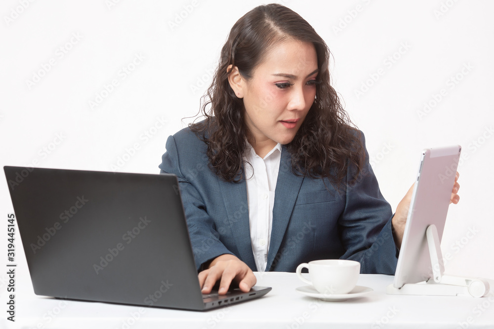Beautiful young executive with her work and coffee Beautiful young executive with her work and coffee