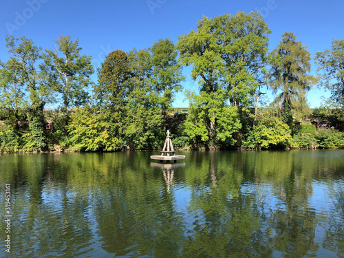 The lake Mannenweier or Mannenweiher pond (Three Ponds recreation area or Das Naherholungsgebiet Drei Weihern), Drei Weieren - St. Gallen, Switzerland photo