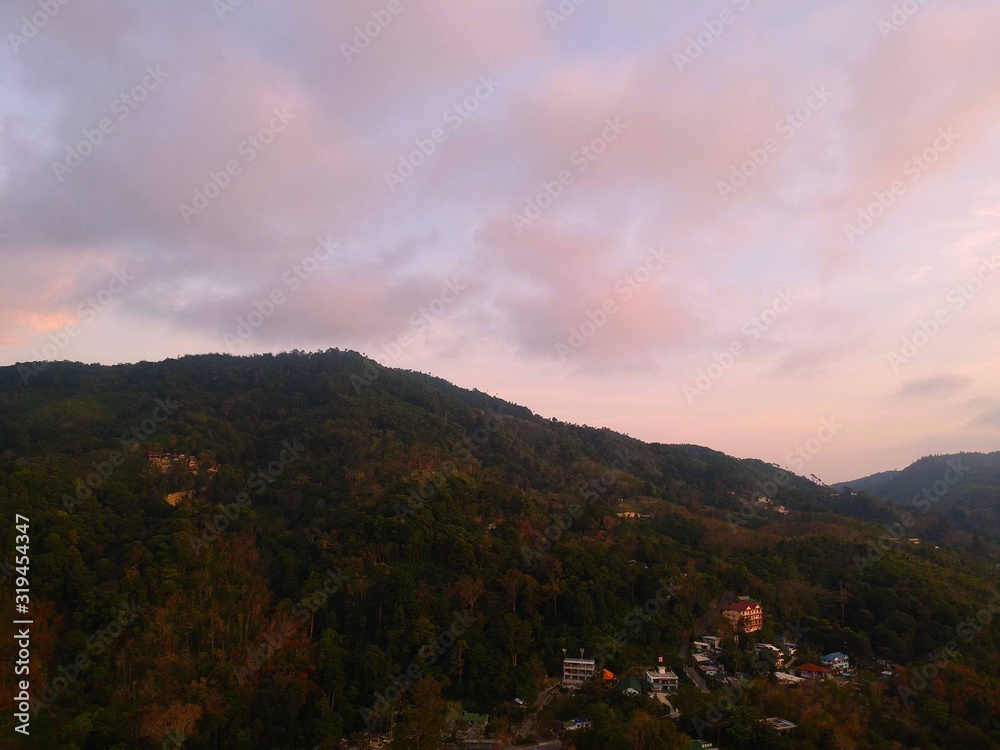 Panoramic Aerial View of Patong Mountains Phuket Thailand with the Sunset creating many beautiful colours
