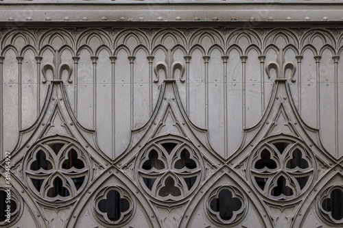 The gothic ajury pattern of dark old metal. Portugal.
 photo