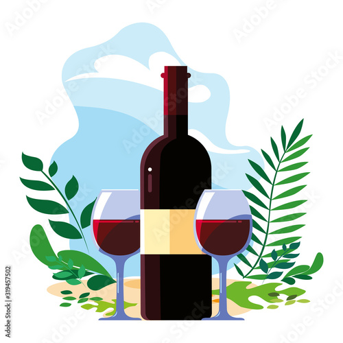 bottle and glass of wine with background landscape