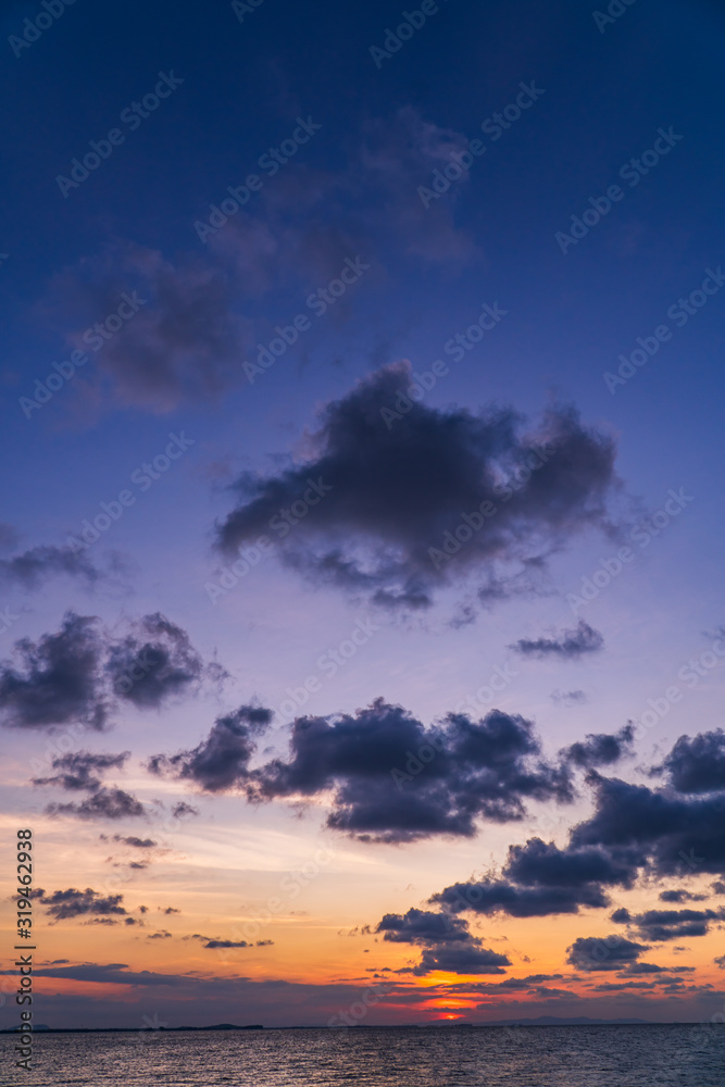 dramatic sky vertical with clouds on twilight in the evening 