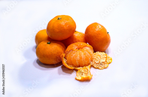 Оrange mandarines or tangerines fruits isolated on white background