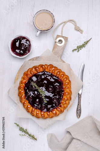 Open pie with berry jam