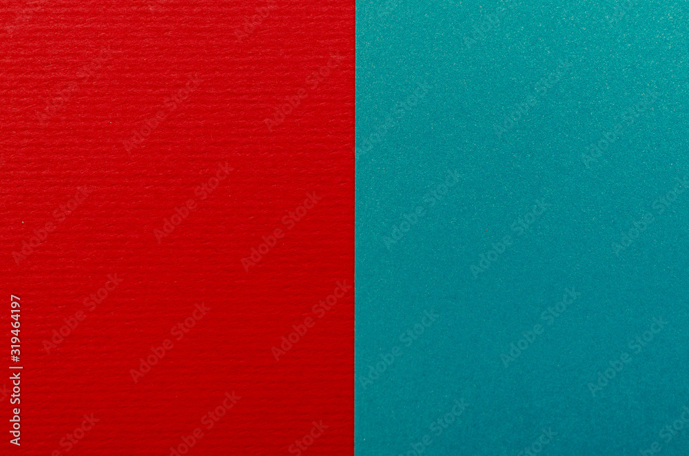 Fototapeta premium Red and blue paper texture background. Place for text. Two tones. Background for presentation.