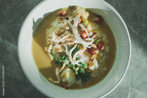 Chicken Porridge "bubur ayam" typical food in Indonesia and served in the morning for the breakfast menu