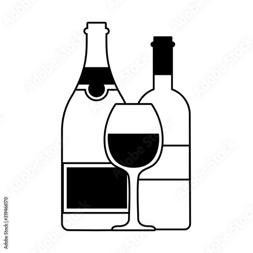 bottle and glass of wine on white background