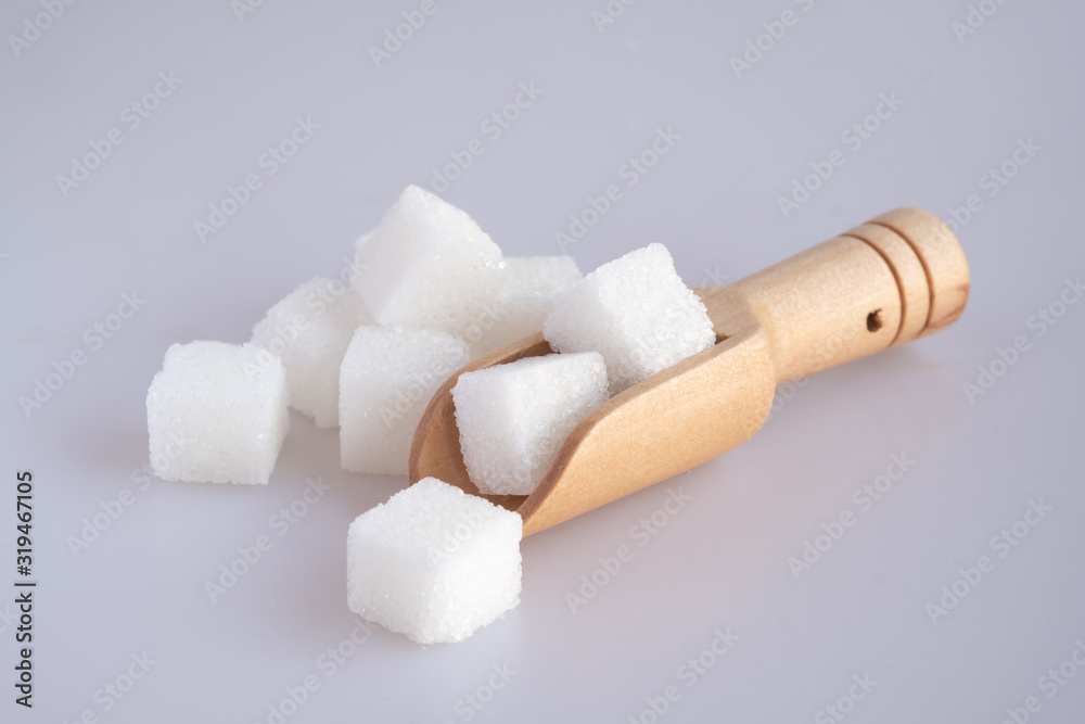 White sugar cube on white background. White sugar cube on white background.