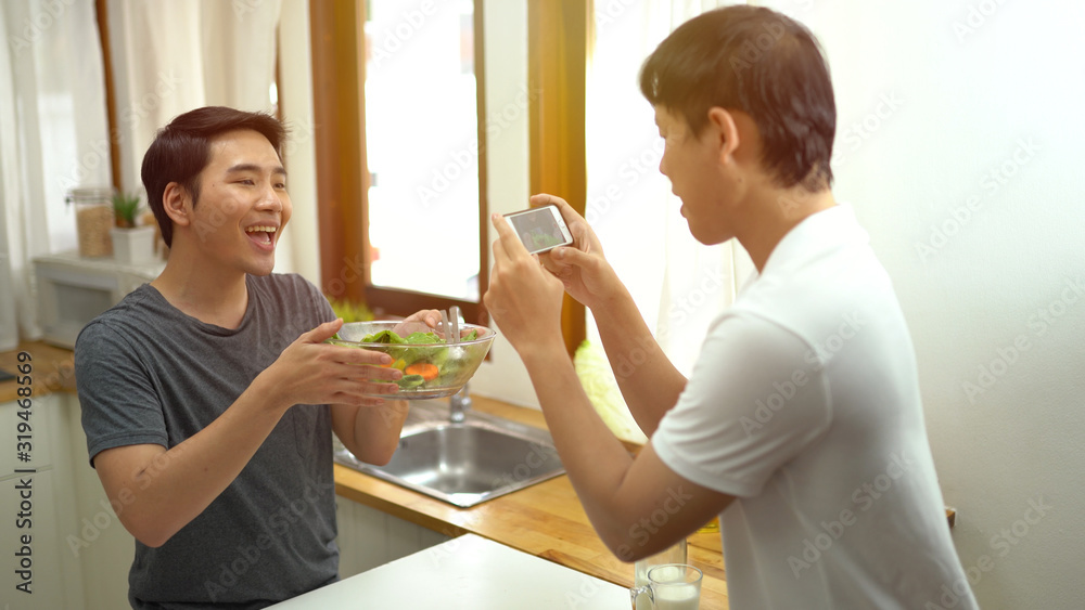Gay couple taking selfie and live streaming Gay couple taking selfie and live streaming