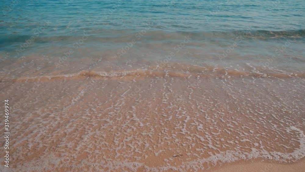 Clean sea water washing the shores of a beach Clean sea water washing the shores of a beach