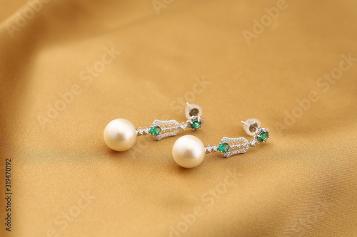 Platinum Pearl Earrings inlaid with diamonds and gold