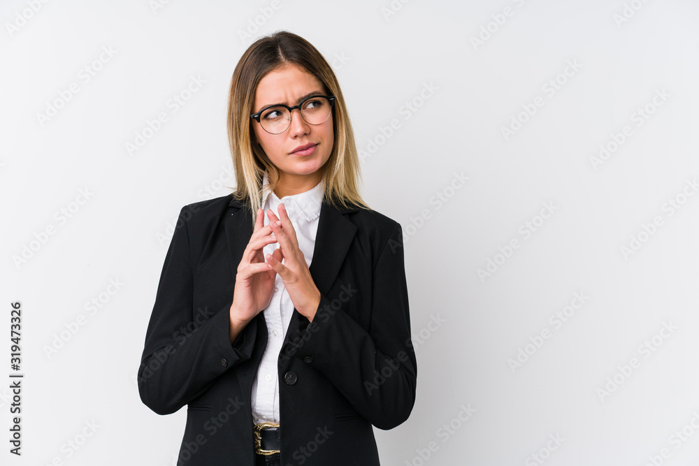 Young business caucasian woman making up plan in mind, setting up an idea. Young business caucasian woman making up plan in mind, setting up an idea.