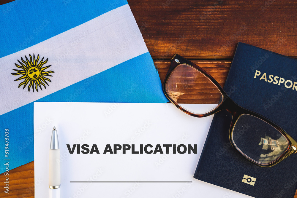 flag-of-argentina-visa-application-form-and-passport-on-table-stock-photo-adobe-stock
